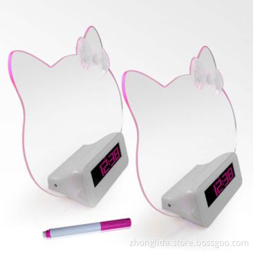 Novelty digital clock with transparent message board
